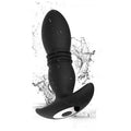 Plug anal vibrant va-et-vient en silicone noir – vue produit avec éclaboussures d'eau