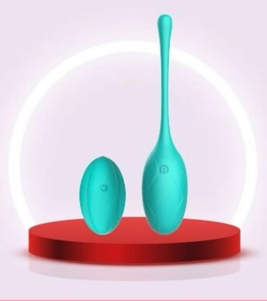 KINKY SECRET by Lady Mary — Œuf vibrant ECHOS vert avec télécommande, en silicone liquide, sur socle rouge