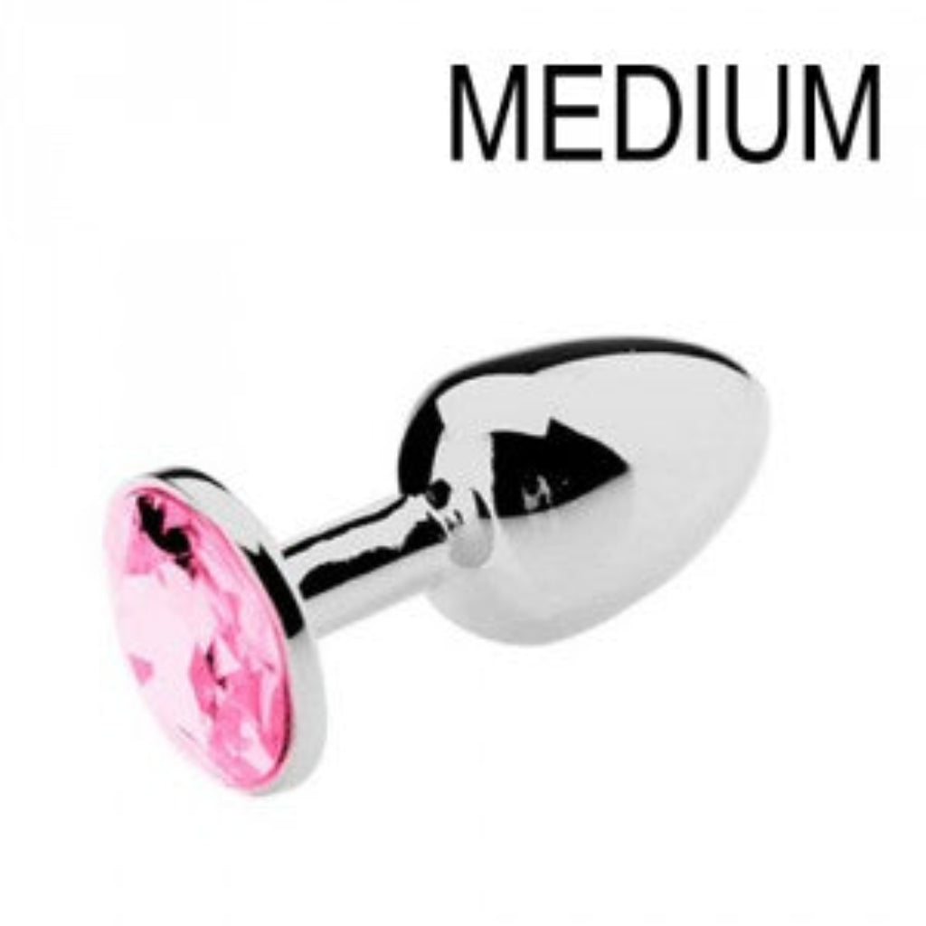 Plug anal bijou avec pierre rose quartz, profil élégant, finition argentée polie
