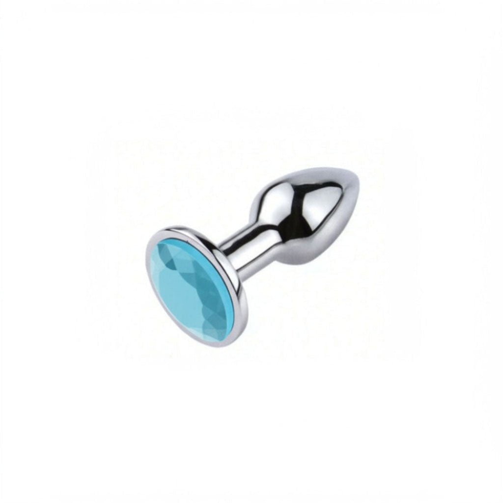 Plug anal en acier inoxydable orné d'une pierre bleu ciel, grand format, fond blanc