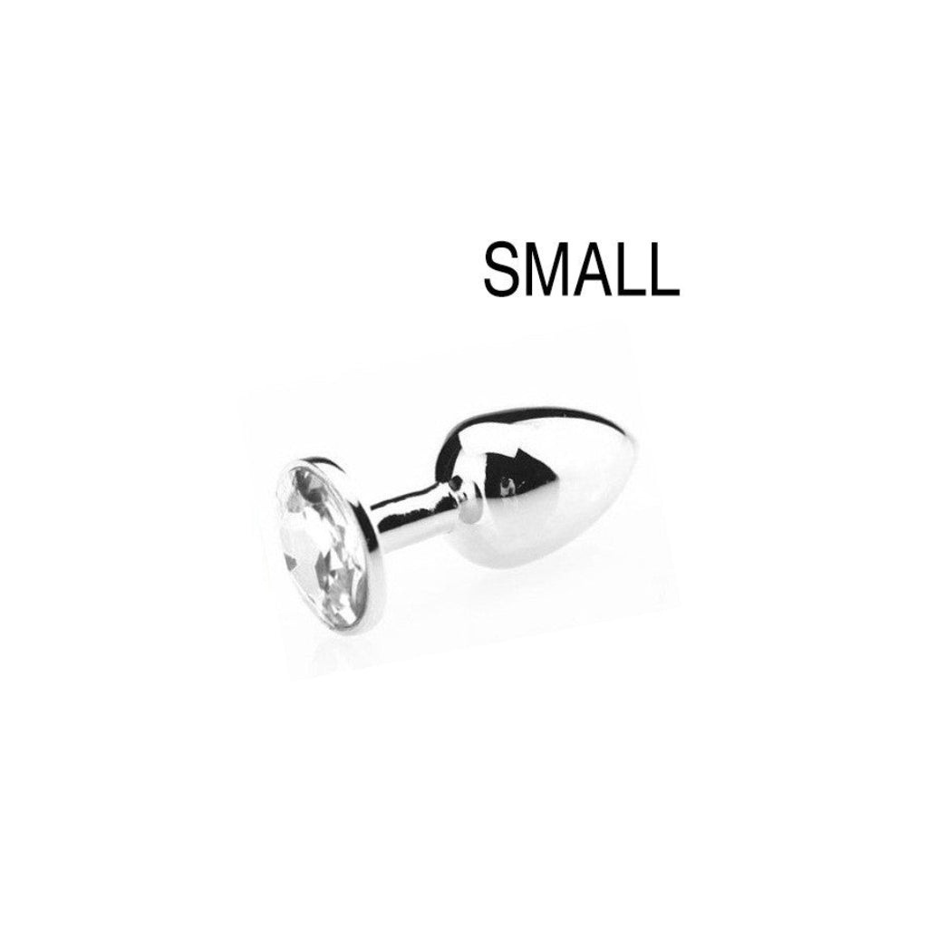 Plug anal bijou avec pierre transparente cristal, profil élégant, finition argentée polie